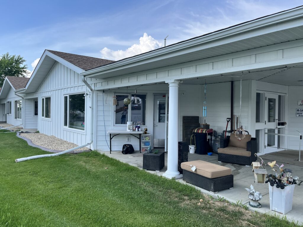 Single-storey residential building with covered entrance and front walkway