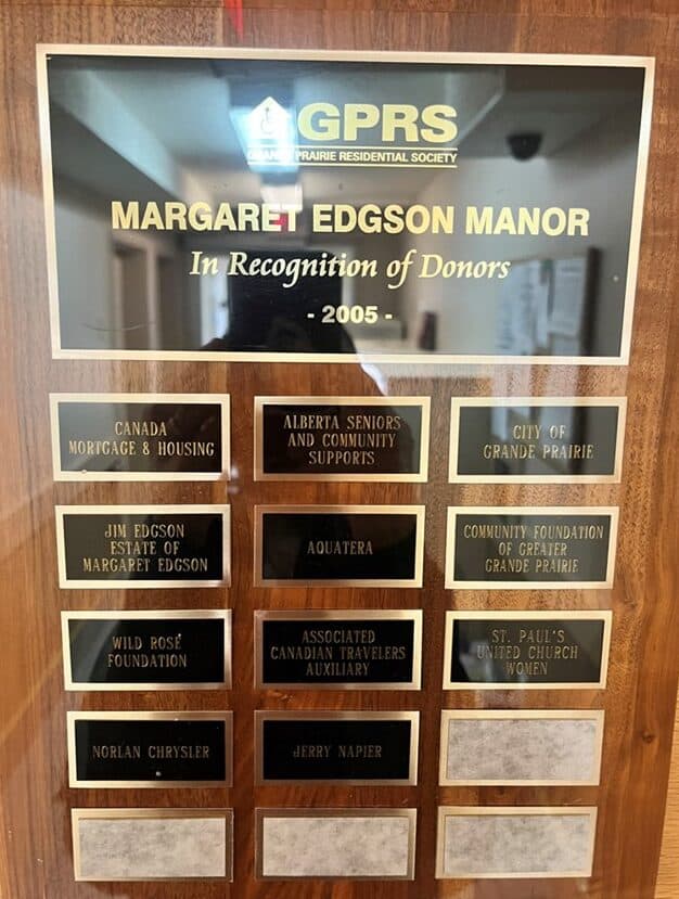 Donor recognition plaque at Margaret Edgson Manor honoring contributors to Grande Prairie Residential Society, dated 2005